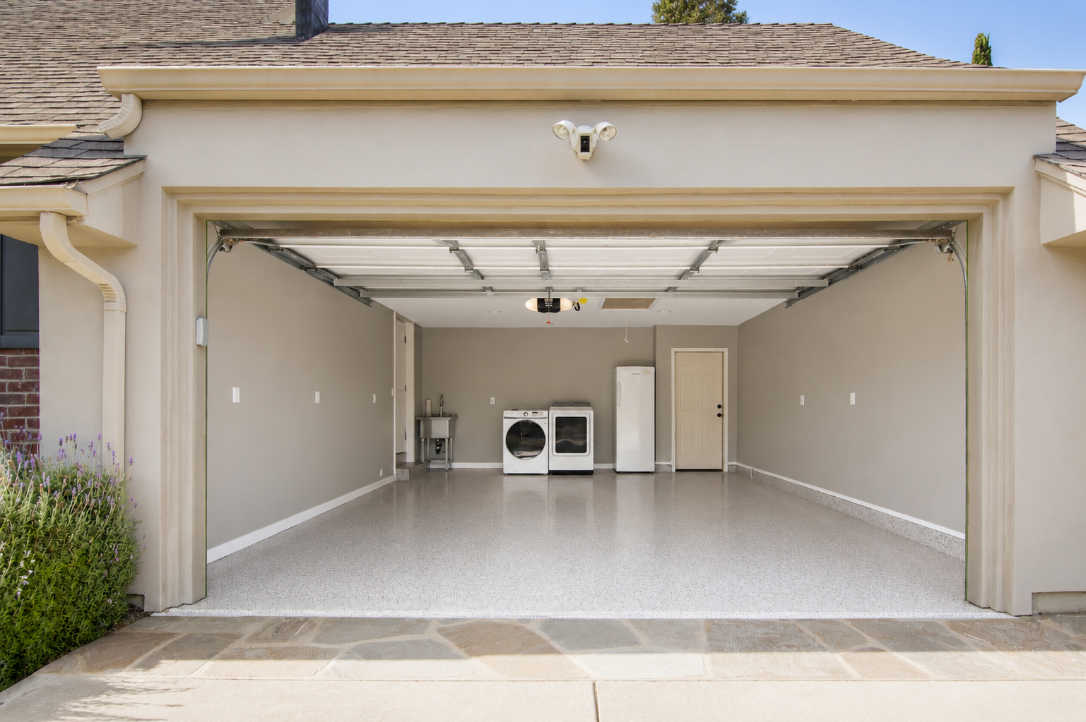 Exterior view of garage with epoxy floor